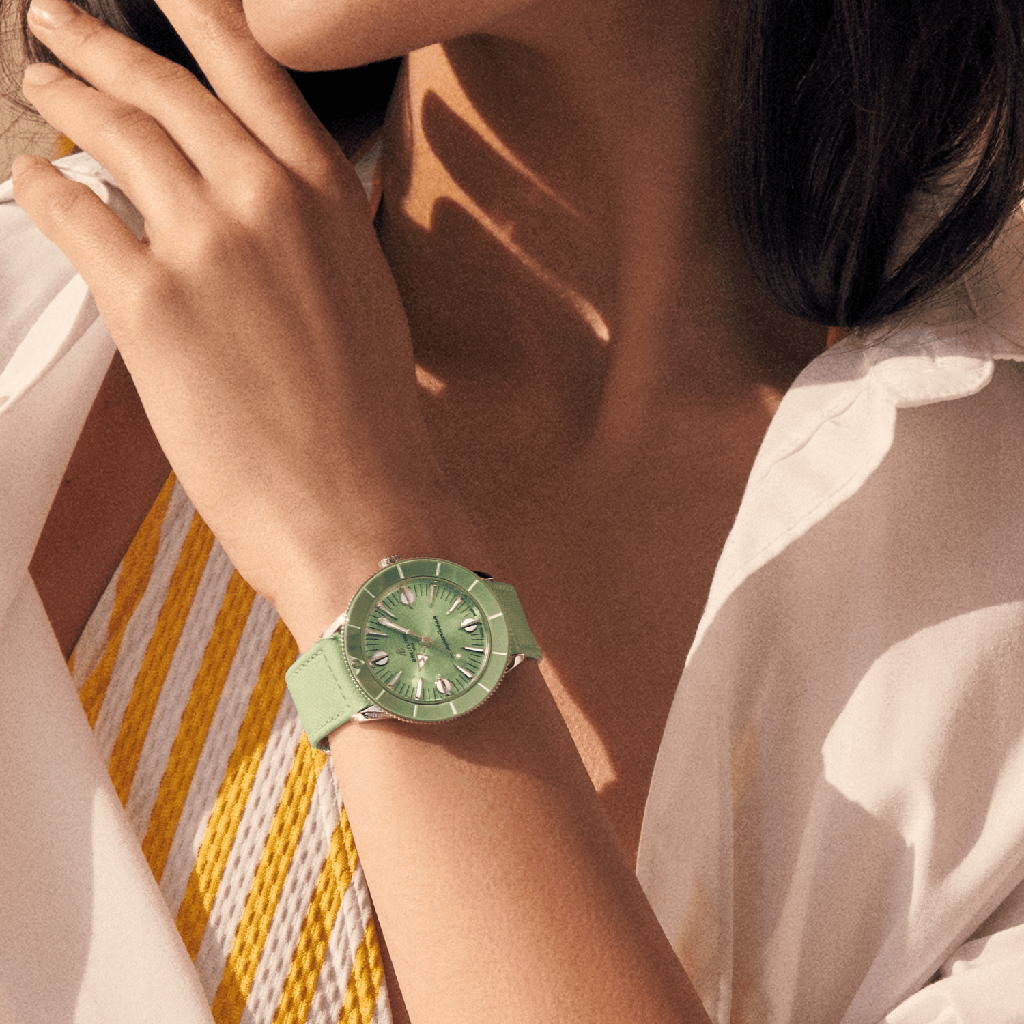 a10340361l1x1-superocean-heritage-57-pastel-paradise-on-wrist_36cb6e86-9956-46c9-af5a-5cb82573dc4b.png