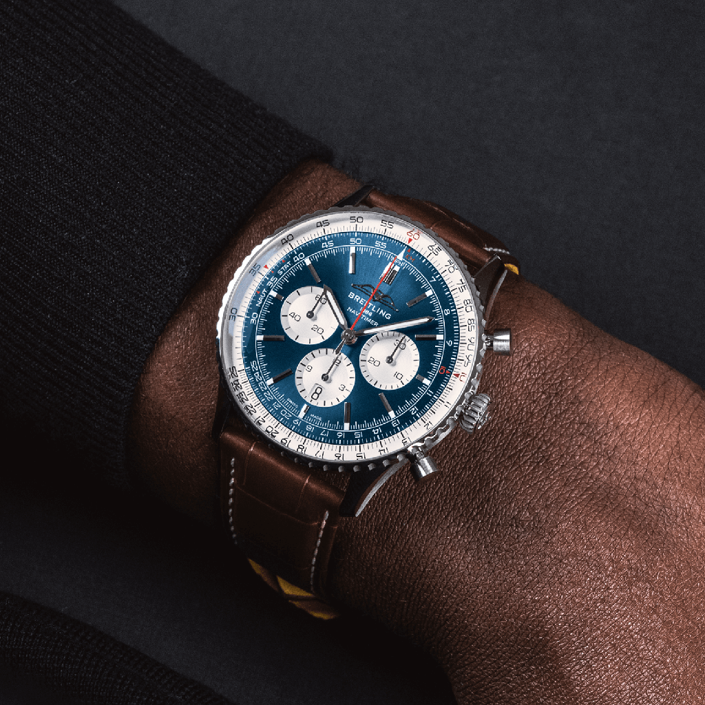 ab0137211c1p1-navitimer-b01-chronograph-46-on-wrist_0a1f5436-4096-4ed3-bc4d-a5e2651fe68d.png