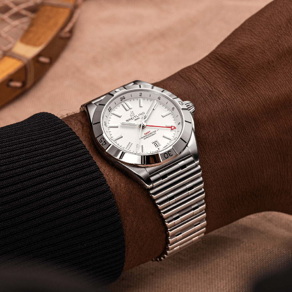 a32398101a1a1-chronomat-automatic-gmt-40-on-wrist_bfa7f10a-919d-4a57-95d1-5ad161574988.png