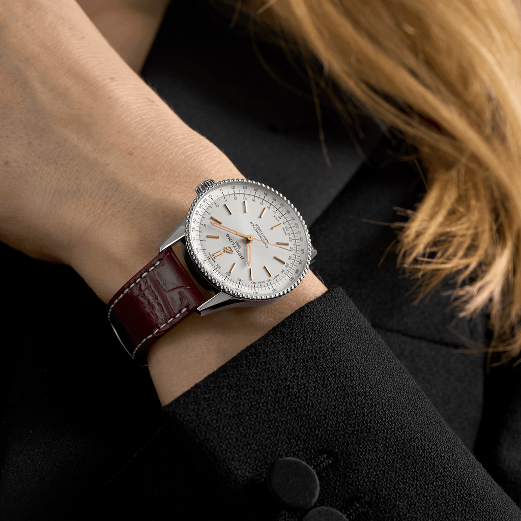 a17327211g1p1-navitimer-automatic-36-on-wrist_6e207677-1ff8-4628-9874-98b0a1dd5e1a.png