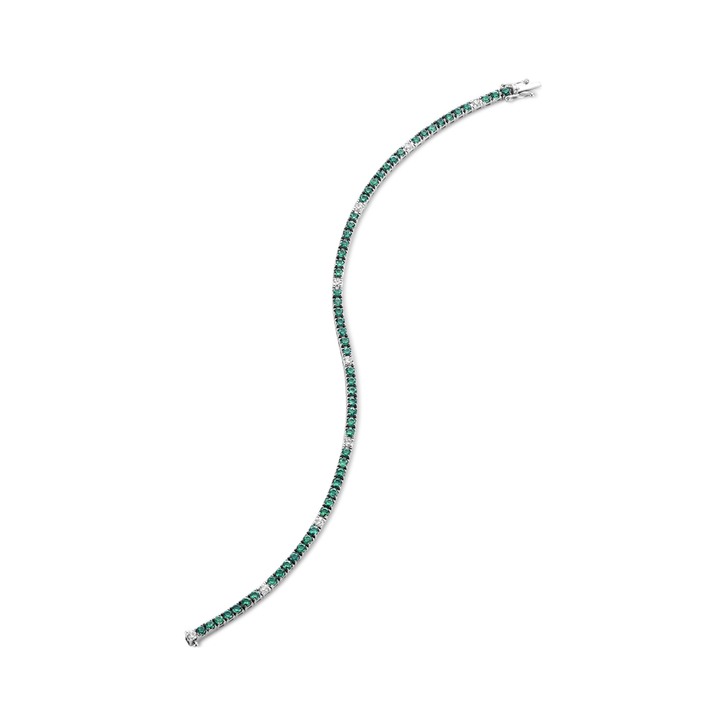 Tennis bracelet with emeralds and diamonds