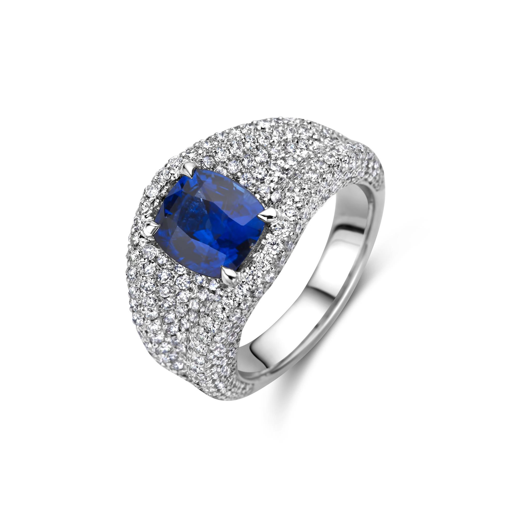 White gold pave diamond ring with cushion cut blue sapphire