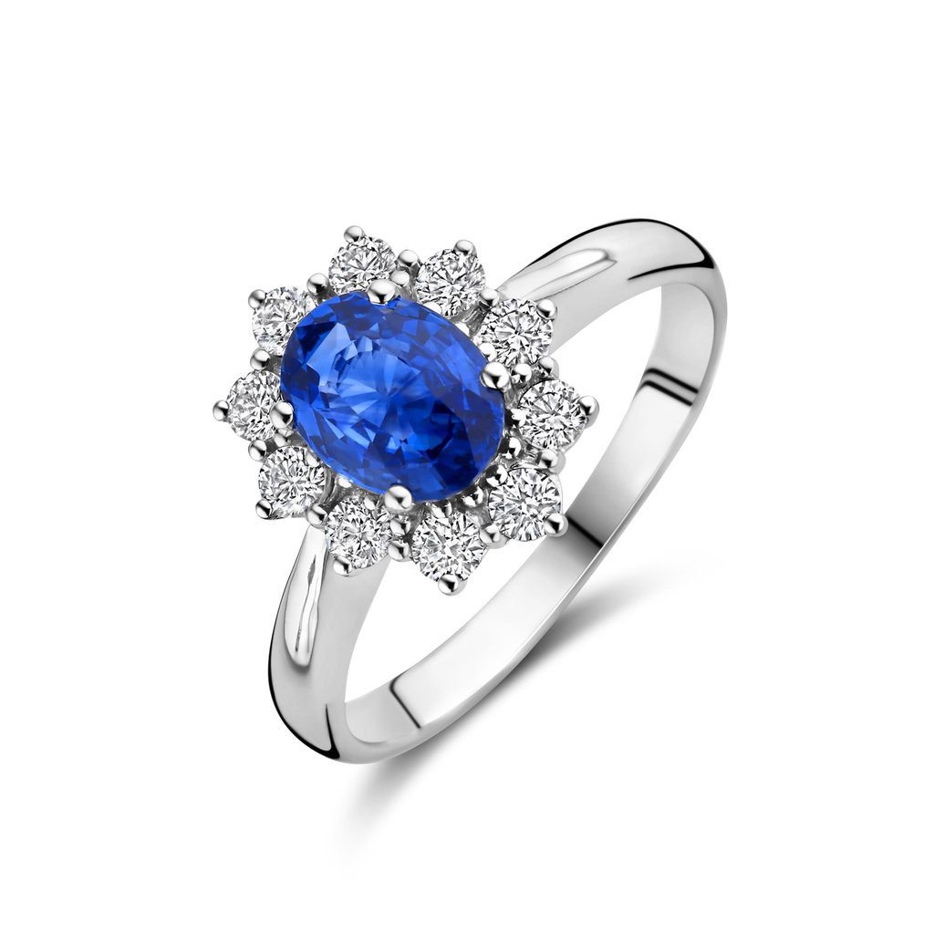 White gold ring with sapphire and white diamonds